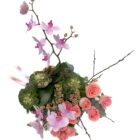 Arreglo de flores naturales con 12 rosas, orquídea de 3 varas, coles, uña de gato y follaje en una canasta con listón.